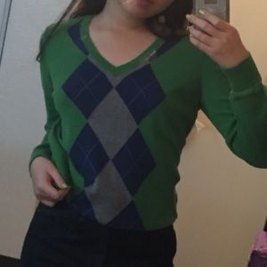 Green and blue argyle sweater